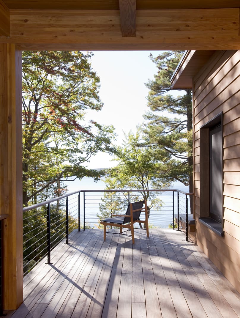 Chair on a porch with a view of Lake Sunapee
