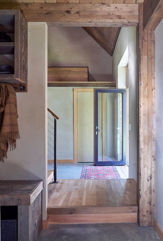 Looking towards the front door from inside the coat area