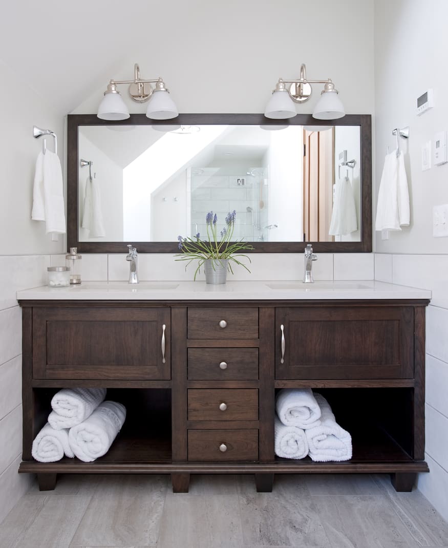A modern bathroom vanity and mirror