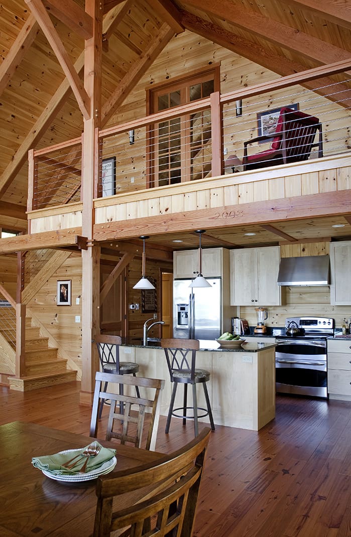Kitchen and open loft in a modern rustic cabin